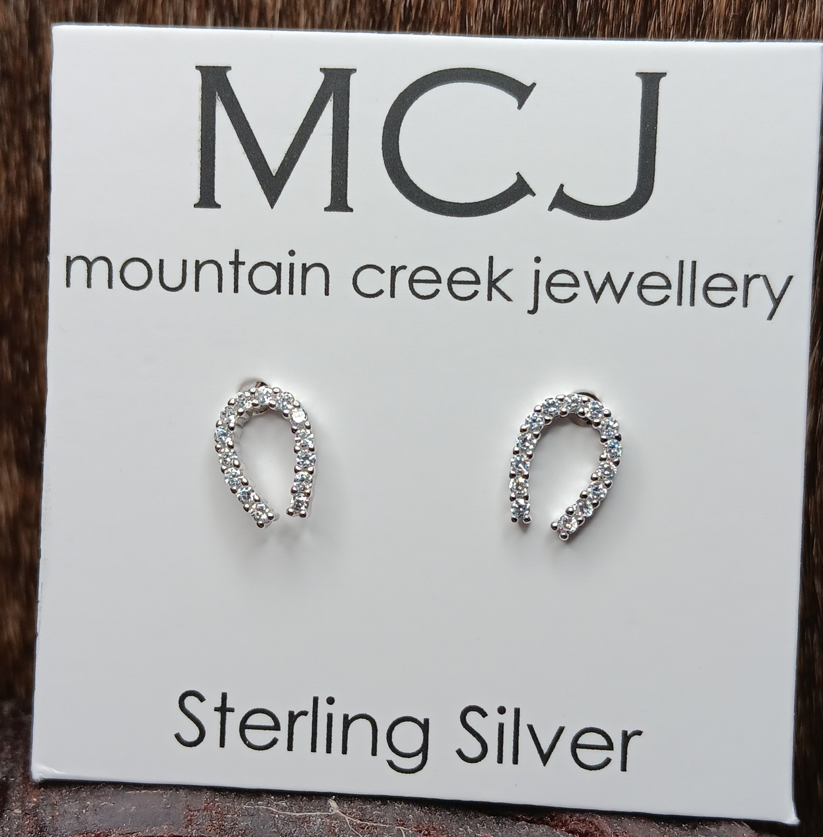 MCJ Studs Cubic Zirconia Horseshoe